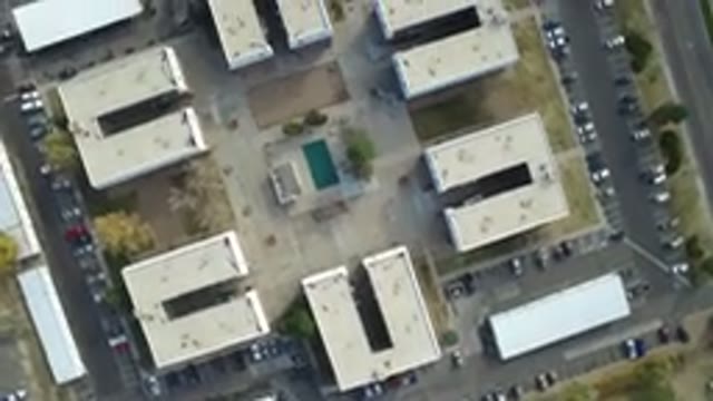 HIDDEN LAKE COLORADO-2016: Six White C-Shaped Buildings Facing In Towards Each