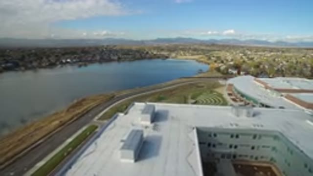HIDDEN LAKE COLORADO-2016: City With Hotel And Houses Around A Lake With Calm