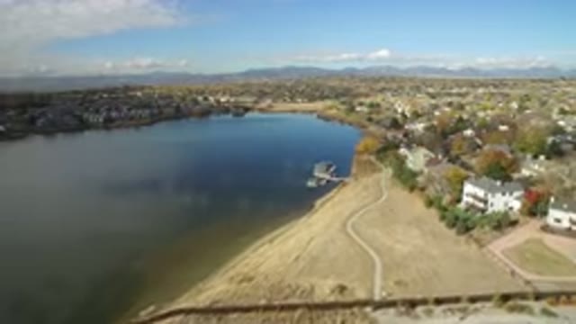HIDDEN LAKE COLORADO-2016: Lake With Dock Surrounded By Suburban Neighborhood