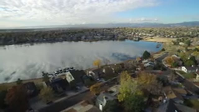 HIDDEN LAKE COLORADO-2016: The Reflection Of The Clouds On The Lake On A Bright
