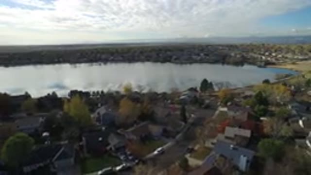 HIDDEN LAKE COLORADO-2016: An Aerial Of Buildings In A Neighborhood With Trees