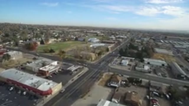 HIDDEN LAKE COLORADO-2016: Aerial View Of Intersection Showing Cars Buildings