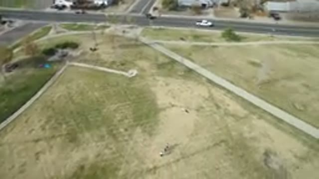 HIDDEN LAKE COLORADO-2016: Grassy Area Outside Of A Building With Outdoor Seating