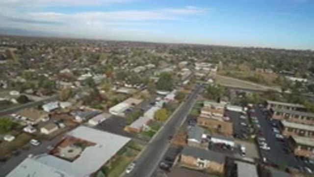 HIDDEN LAKE COLORADO-2016: Top View Of A City With Lots Of Buildings And Vehicles