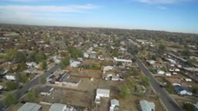 HIDDEN LAKE COLORADO-2016: Aerial View Of Suburban Street Cape That Pans Over
