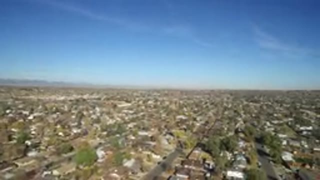 HIDDEN LAKE COLORADO-2016: The Expanse Of The City With Trees And Houses Seems