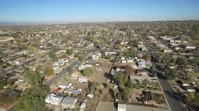 HIDDEN LAKE COLORADO-2016: Drone Camera Filming A City From Above With Many