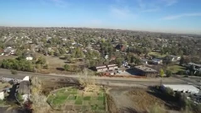 HIDDEN LAKE COLORADO-2016: Sky View Of A Town Surrounded By Trees And Main Road