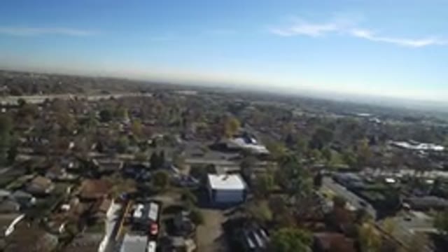 HIDDEN LAKE COLORADO-2016: Aerial View Of A Town From High Above With Sun