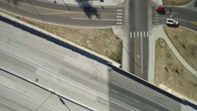 HIDDEN LAKE COLORADO-2016: Aerial Footage Of Busy Intersection With A Bridge