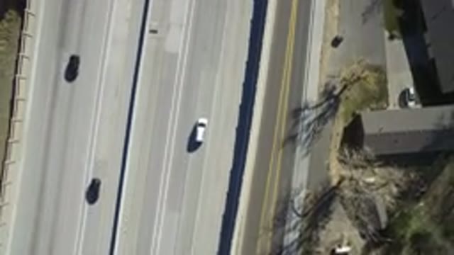 HIDDEN LAKE COLORADO-2016: Cars Driving Down The Highway At Reasonable Speed