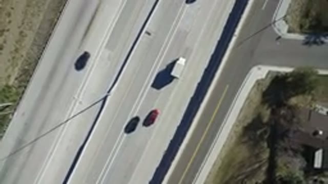 HIDDEN LAKE COLORADO-2016: Overhead View Of Traffic On A Paved Highway In The