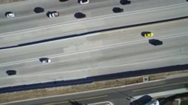 HIDDEN LAKE COLORADO-2016: Overhead View Of A Sun-Bleached Six-Lane Highway With