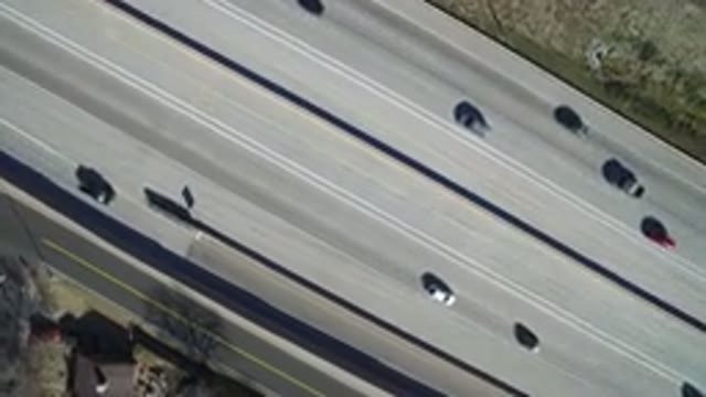 HIDDEN LAKE COLORADO-2016: Drone Captures Cars As They Cruise Along The Four-Lane Highway