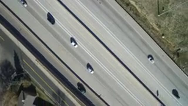 HIDDEN LAKE COLORADO-2016: Car Traffic On A Busy Highway With Some Construction