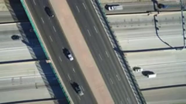 HIDDEN LAKE COLORADO-2016: Rotating Birds-Eye View Of Highway Traffic During