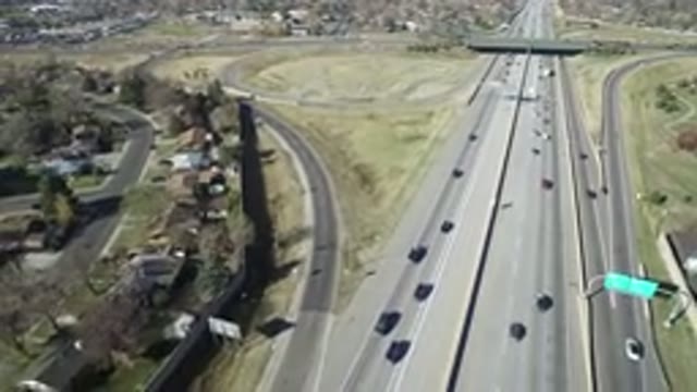 HIDDEN LAKE COLORADO-2016: Footage Of Traffic Moving Through Suburban Area Along