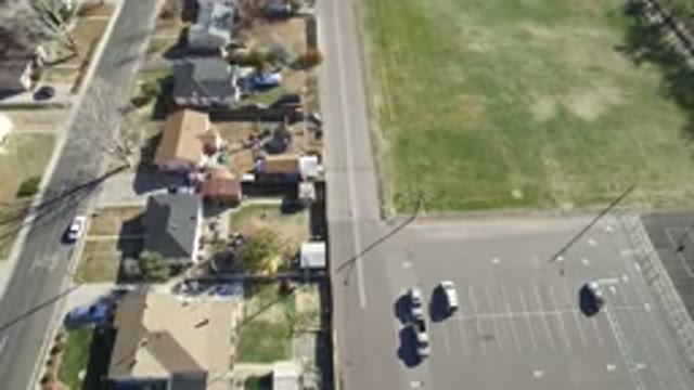 HIDDEN LAKE COLORADO-2016: A Top View Of Buildings Cars Trees Field And Packing