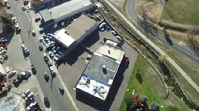 HIDDEN LAKE COLORADO-2016: Drone Shooting Video Of A Street Showing Cars And Small Buildings