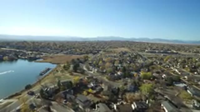HIDDEN LAKE COLORADO-2016: Top View Of A City With Several Houses And Many Big Trees