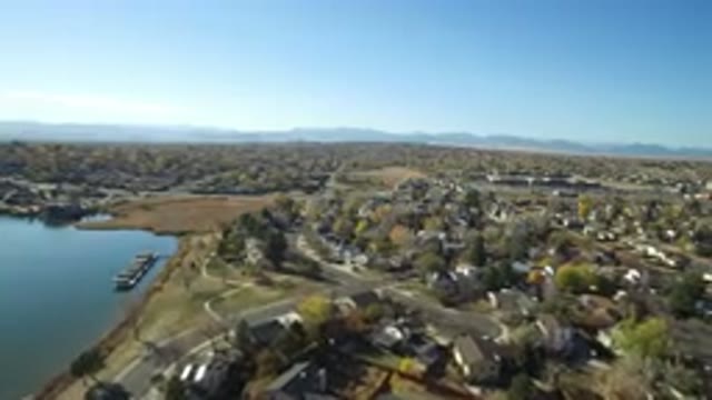 HIDDEN LAKE COLORADO-2016: Aerial View Of A Town On A Lake With Empty Roads On