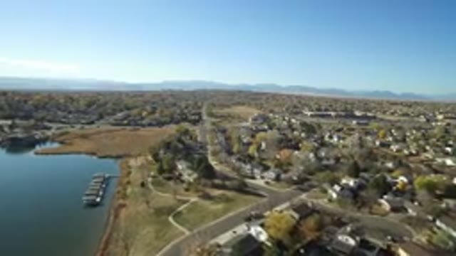 HIDDEN LAKE COLORADO-2016: Aerial View Of Seaside Town With Houses And Roads