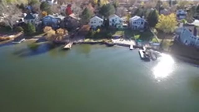 HIDDEN LAKE COLORADO-2016: Aerial View Of Houses With Boats And A Lake