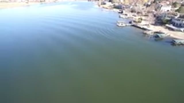 HIDDEN LAKE COLORADO-2016: Houses Built By The Lake With Blue Water And Calm
