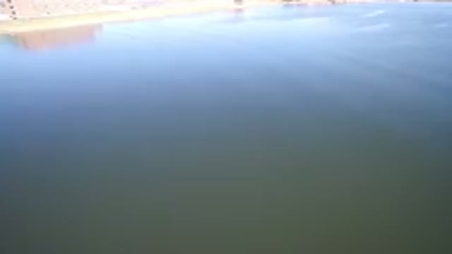 HIDDEN LAKE COLORADO-2016: An Aerial View Of A Large Body Of Water With Ripples