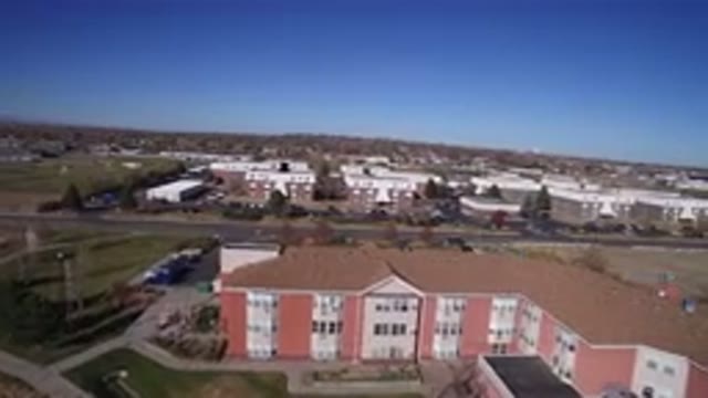 HIDDEN LAKE COLORADO-2016: Aerial Video Of A Pink Hotel Or Apartment Complex And