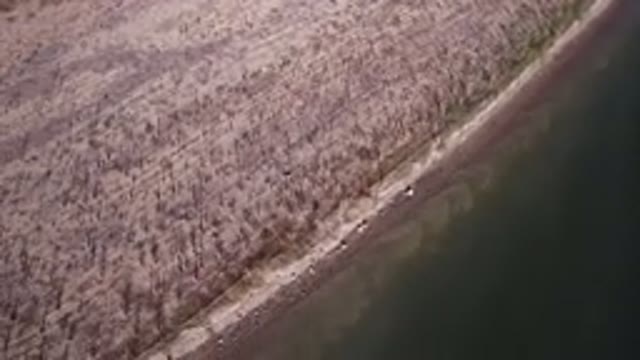 HIDDEN LAKE COLORADO-2016: An Airplane Flying Over a Beautiful Piece of Dry Land