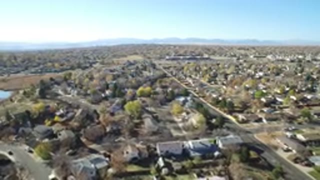 HIDDEN LAKE COLORADO-2016: View Of A Beautiful City Houses With Lots Of Green