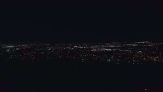 DENVER COLORADO-2016: The Dark Night Sky And The City Lights That Glow In It
