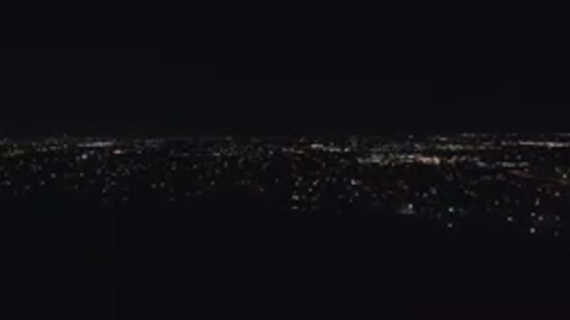 DENVER COLORADO-2016: Aerial View Of A Metropolitan City Lit Up At Night