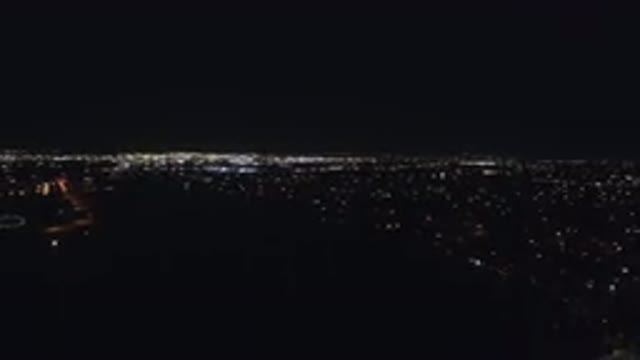 DENVER COLORADO-2016: Camera Showing A City In The Night With Many Buildings