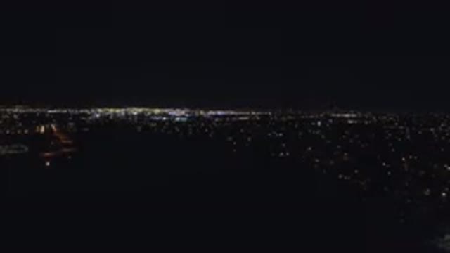 DENVER COLORADO-2016: Dark Night Highlighting The Lights Of A Large City In The