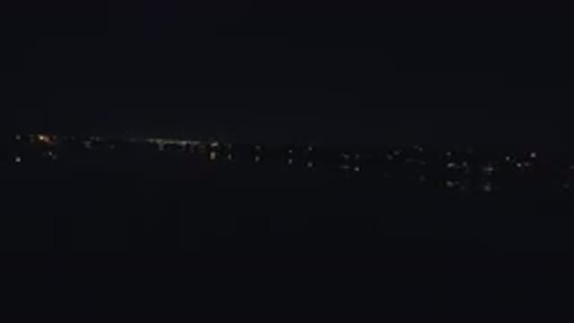 DENVER COLORADO-2016: View Of A Lake At Night With A City Beside It With Lots Of Lights