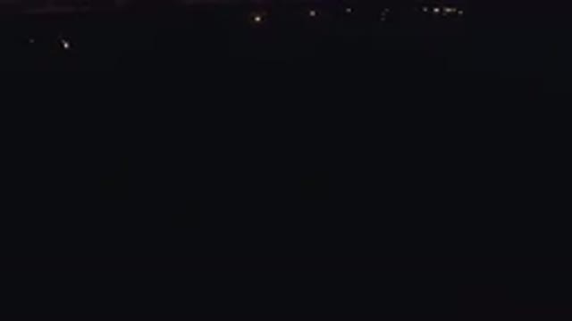 DENVER COLORADO-2016: An Aerial View Of A Dark Street With Street Lamps