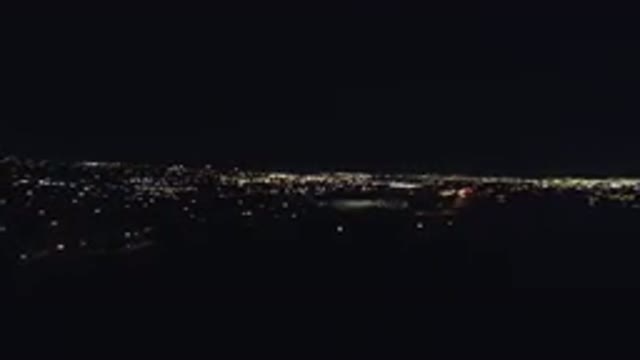 DENVER COLORADO-2016: Birds-Eye View of City Lights on a Pitch Black Night