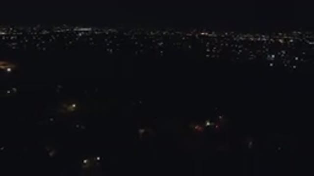 DENVER COLORADO-2016: An Aerial View Of A Dark City Landscape With Scattered Lights
