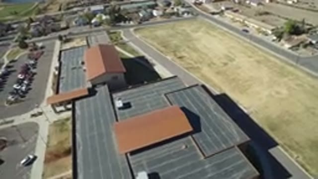 WESTMINSTER COLORADO-2016: An Aerial View Of A Large Building With A Parking Lot