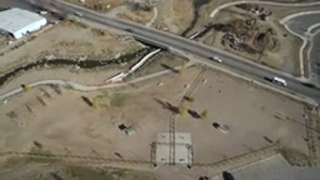 WESTMINSTER COLORADO-2016: Desolate Dry Sandy Unused Land Beside Busy Highway