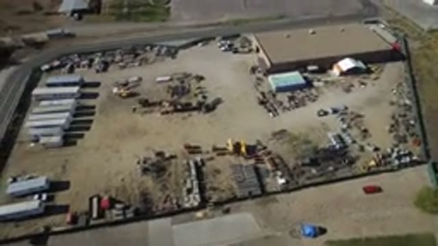 WESTMINSTER COLORADO-2016: Industrial Area With Trucks Parked And Other Spaces