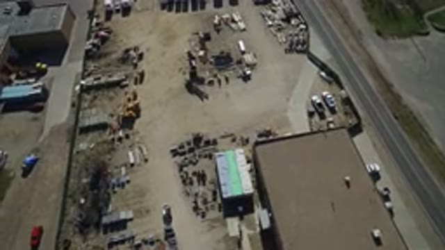 WESTMINSTER COLORADO-2016: An Aerial View Of A Shed With Some Cars And Paths