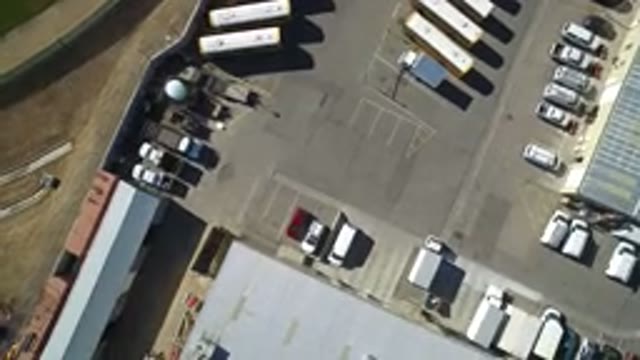 WESTMINSTER COLORADO-2016: An Aerial View Of A Shed With Some Trucks And Some