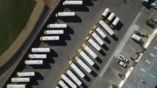 WESTMINSTER COLORADO-2016: Aerial View Of Identical Semi Trucks Evenly Parked