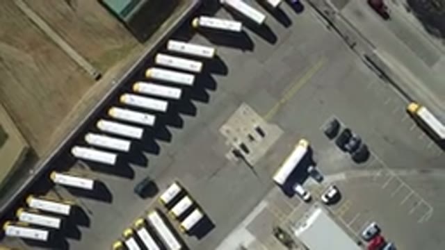 WESTMINSTER COLORADO-2016: An Aerial View Of A Parking Lot Beside A Tennis Court