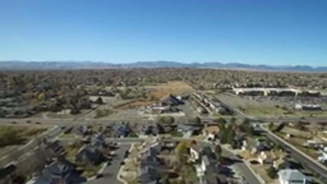 HIDDEN LAKE COLORADO-2016: Aerial Shot Of Cars Going By A Town With A Cul-De-Sac