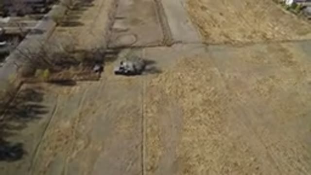 HIDDEN LAKE COLORADO-2016: An Aerial View Of A Dried Grassy Field And Nearby Buildings