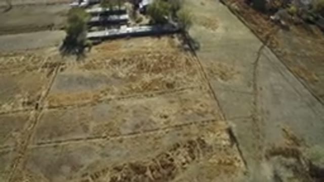 HIDDEN LAKE COLORADO-2016: Aerial View Of A Torn Up Cornfield During The Day